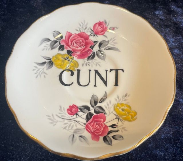 Bright Floral Saucer with "CUNT" On It