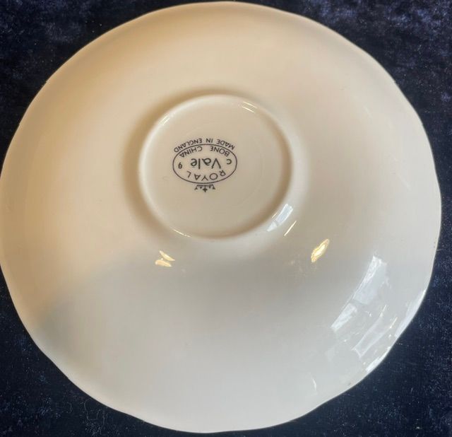 Bright Floral Saucer with "CUNT" On It