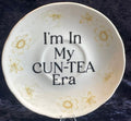 "I'm In My CUN-Tea Era" Saucer